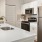 a kitchen with white cabinets
