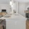 a kitchen with a table and chairs