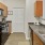 a kitchen with a sink and refrigerator