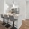 a kitchen with a dining table and chairs
