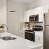 kitchen with white counters and cabinets