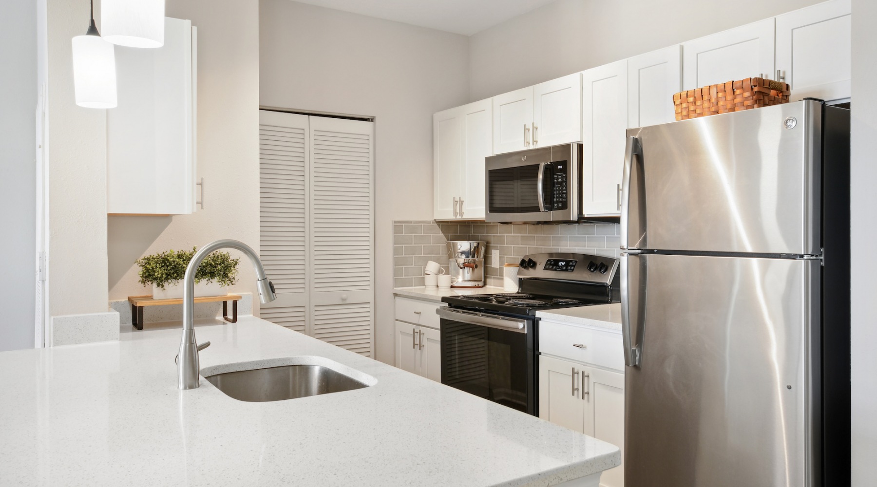 Spacious kitchens with thoughtful details kitchen with white counters and cabinets